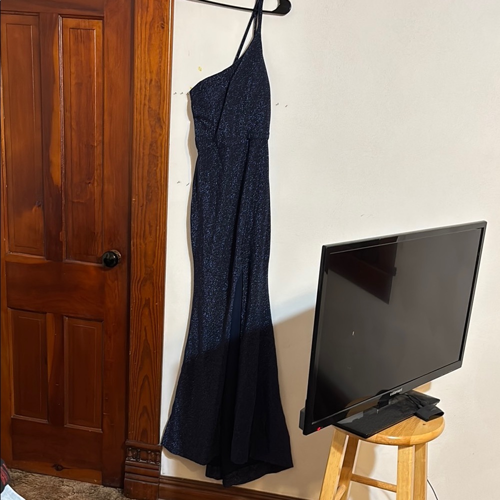 Elegant sparkling Navy Blue Evening Gown size 3. Stretchy and comfortable.